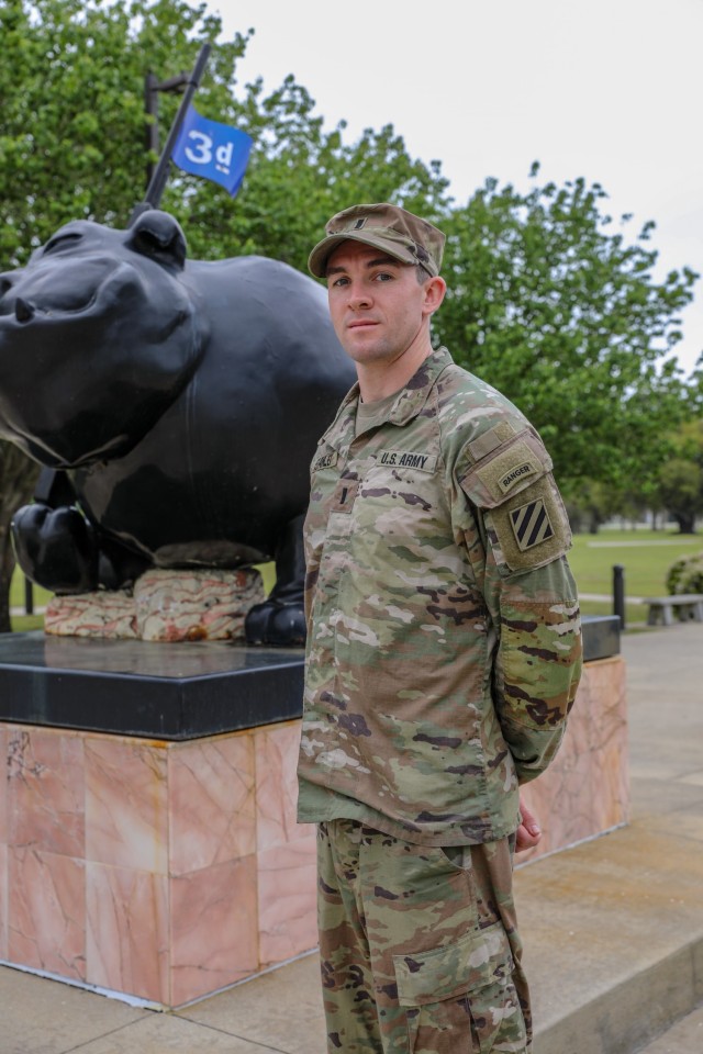 U.S. Army 1st Lt. David Stanley, a tank company executive officer assigned to 1st Armored Brigade Combat Team, 3rd Infantry Division, poses next to 3rd ID’s Rocky statue, March 31, 2021, on Fort Stewart, Georgia. Stanley and his training partner departed from Camp Casey, South Korea, earlier this year to participate in the upcoming Best Ranger Competition slated to take place at Fort Benning, Georgia, April 16-18. (U.S. Army photo by Pfc. Summer Keiser)