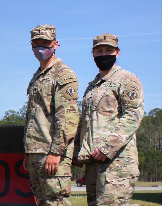 U.S Army 1st Lt. Andrew Wilhelm and 1st Lt. Madison Jones, both assigned to 92nd Engineer Battalion, pose for a photo on Fort Stewart, Georgia, April 7, 2021. These lieutenants are slated to compete in the Army’s Best Sapper Competition on Fort...