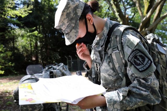 Cadet Capt. Pulani Tremel works on the orienteering portion of the Zama Middle High School Junior Reserve Officers’ Training Corps Cadet Leadership Challenge at Camp Zama, Japan, April 7.