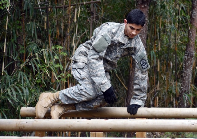 Cadet Sgt. Anthony Escalera completes the obstacle course during the Zama Middle High School Junior Reserve Officers’ Training Corps Cadet Leadership Challenge at Camp Zama, Japan, April 6.