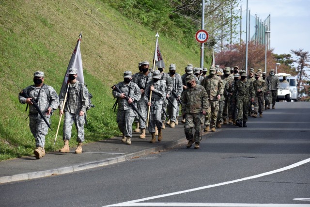 Members of the Zama Middle High School Junior Reserve Officers’ Training Corps participate in a nearly 3-mile road march during the organization’s Cadet Leadership Challenge at Camp Zama, Japan, April 6.