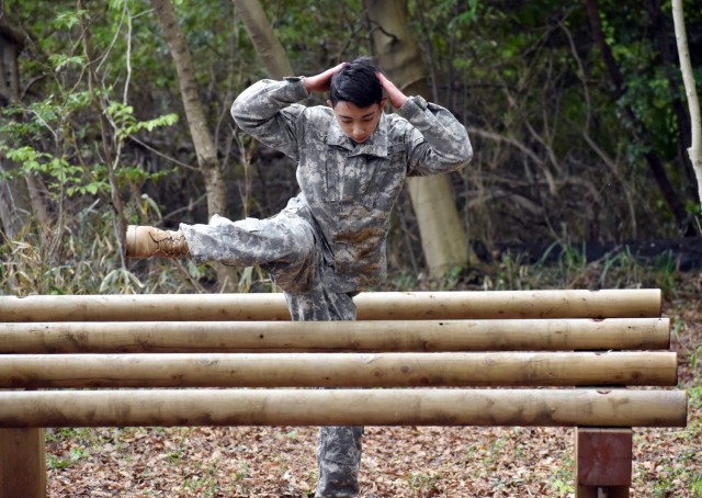 Cadet Pvt. Vincent Carlo completes the obstacle course during the Zama Middle High School Junior Reserve Officers’ Training Corps Cadet Leadership Challenge at Camp Zama, Japan, April 6.