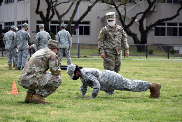 Cadet Master Sgt. Jhaniyah Wynn completes the push-up portion of the Army Combat Fitness Test during the Zama Middle High School Junior Reserve Officers’ Training Corps Cadet Leadership Challenge at Camp Zama, Japan, April 6.