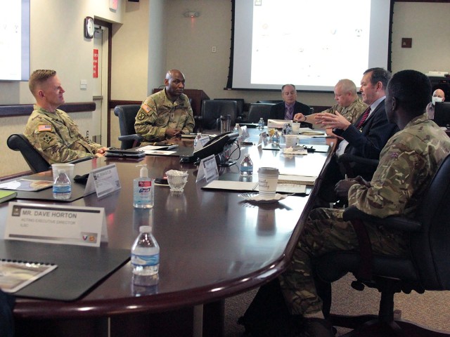 Maj. Gen. Darren Werner (left), Commanding General U.S. Army Tank-automotive and Armaments Command, hosted Chris Bushell (directly across), Director General Land of the U.K. Ministry of Defence, at the Detroit Arsenal, Michigan Apr. 13.  The two...