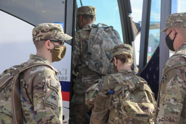 U.S. Army Soldiers assigned to 2nd Brigade, 4th Infantry Division, based at Fort Carson, Colorado, board buses to deploy to the Pueblo Community Vaccination Site in Pueblo, Colorado, April 11, 2021. U.S. Northern Command, through U.S. Army North,...