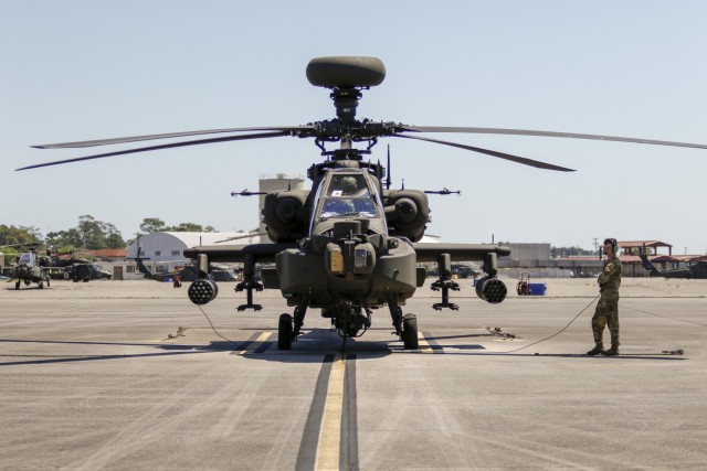 An AH-64E Apache helicopter sits on the flight line at Hunter Army Airfield, Georgia, Apr. 12. Pilots assigned to the 3rd Squadron, 17th Cavalry Regiment, 3rd Combat Aviation Brigade, 3rd Infantry Division, conducted familiarization training on the aircraft as the until transitions to the newer E model from the older D model. The AH-64E Apache is designed to increase power margins and reliability which increases unit readiness and lethality. (U.S. Army photo by Spc. Savannah Roy, 3rd Combat Aviation Brigade, 3rd Infantry Division)