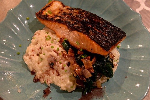 Fort Leavenworth Spouses’ Club cooking class participants made a pan-seared salmon main dish with side dishes of parmesan-herb risotto and baby spinach and bacon sauté during the class led by Chef Jason Wiggin, owner of The Suburban in...
