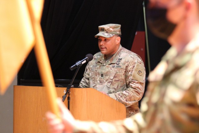 Capt. Keita Rodgers, outgoing commander, Headquarters and Headquarters Company, Special Troops Battalion, 1st Theater Sustainment Command, delivers his final remarks during the company change of command ceremony held at Waybur Theater at Fort Knox Kentucky, April 9, 2021. “I’m confident in Captain Lara’s abilities and ensure you he will also prevail and elevate the unit to better results.” (U.S. Army photo my Staff Sgt. Williams)