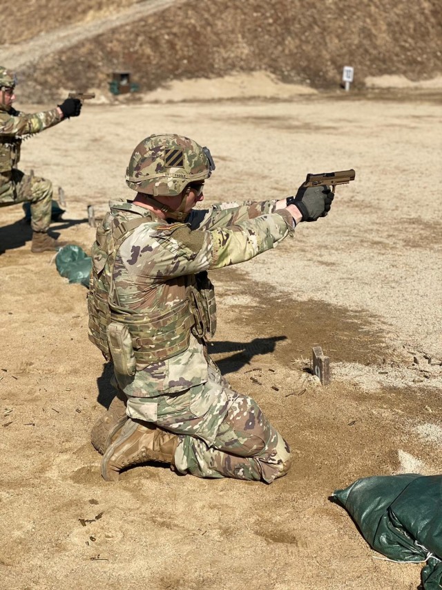First Lt. Jeremy Tuggle practices his marksmanship skills with the M17 pistol on Feb. 24, 2021, while deployed to South Korea. Tuggle, an infantry officer assigned to 2nd Battalion, 7th Infantry Regiment, traveled more than 7,000 miles to...