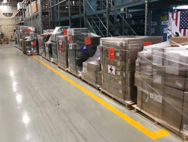 Pallets of medical equipment are prepared for distribution in support of Eighth Army medical units.