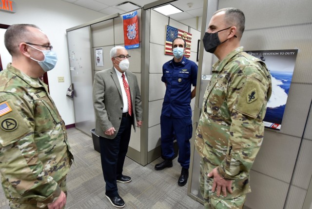 Col. James Jones, Interservice Physician Assistant Program Associate Professor (far left), and Mr. J.M. Harmon III, Deputy to the MEDCoE Commanding General, during a recent walk through of the newly renovated IPAP offices.