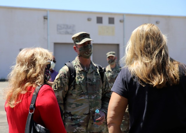 Fort Stewart, Ga. - Maj. Gen. Daniel Mitchell, commanding general, U.S. Army Sustainment Command, talks to civilian employees during a site visit to Fort Stewart’s Modernization Displacement and Repair Site April 13, 2021. Photo by Sgt. 1st...