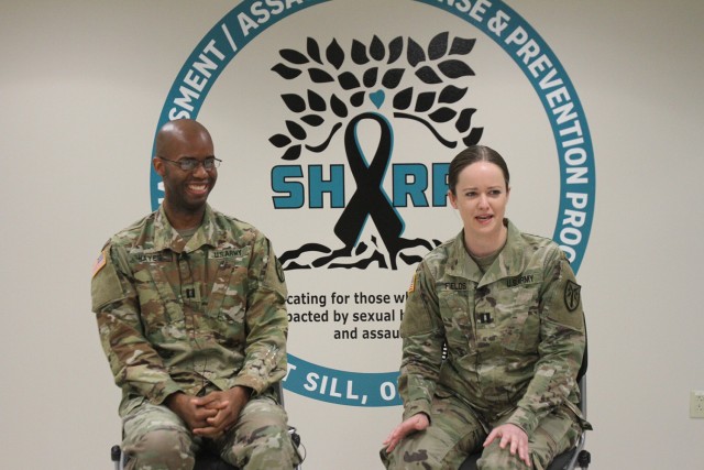 Attorneys Capts. Justin Hayes and Shannon Fields, special victims’ counselors, respond to questions posed by Judy Oman, Fort Sill public affairs videographer. The video and others like it will soon appear on the Fires Center of Excellence Facebook page as part of the SHARP awareness month. 