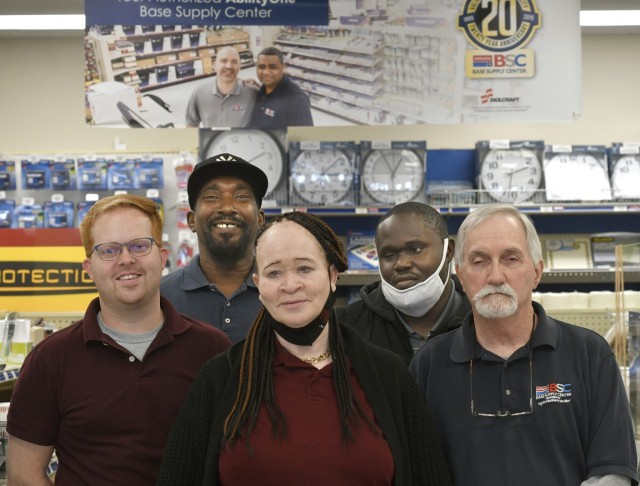 The Fort Lee AbilityOne Base Supply Center staff pose for pictures April 14 at the store. They are, from left to right, Tracey Davis, retail manager; James Drumgole, driver; Elaine Lucus, sales associate; Collin Knight, sales associate; and Steve McGuire, sales associate.  The store, operated by the Virginia Industries for the Blind, is supported by the federal AbilityOne Progam for disabled Americans.