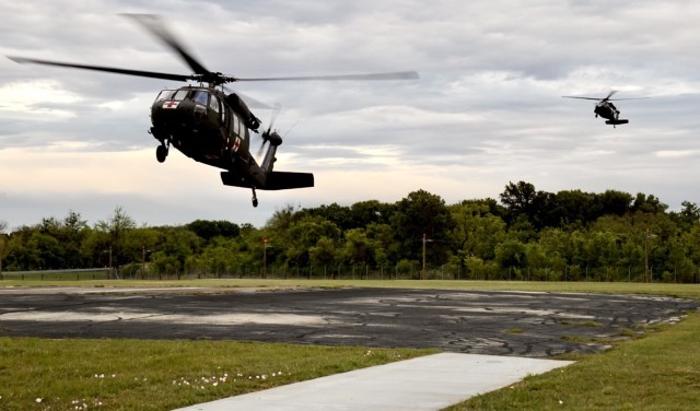 Task Force Phoenix UH-60 Black Hawk helicopters from G Company, 1st Battalion, 168th Aviation Regiment (General Support Aviation Battalion) land at North Fort Hood, Texas, April 17, 2021, during a MEDEVAC training mission that was part of a Culminating Training Exercise. 