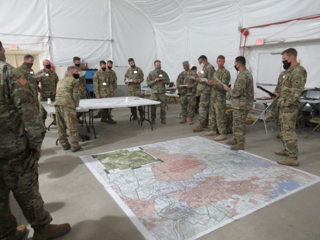 Soldiers from Task Force Phoenix&#39;s 1st Battalion, 168th Aviation Regiment (General Support Aviation Battalion) rehearse a mission during a Culminating Training Exercise at North Fort Hood, Texas, April 12, 2021.