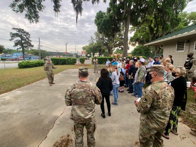 Fort Stewart-Hunter Army Airfield Garrison Commander, Col. Bryan Logan, greets attendees at the beginning of the installation’s spring cemetery tour April 15 at the Liberty County Recreation Area in Hinesville.