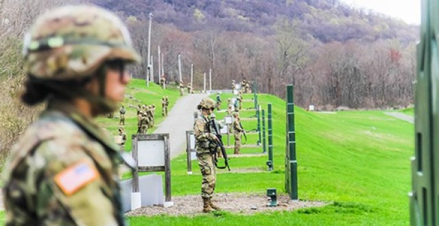 Competitors get ready to fire their M-4’s during the M-4 range portion of the 52nd Sandhurst Military Skills competition on Saturday. Company G-4 was recognized with the Marksmanship Award during the awards ceremony.