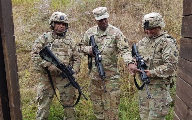 Staff Sgt. McKinely Suell III provides a brief insight on the functions of an M-4 carbine rifle at a weapons range in Mainz-Finthen, Germany, with the 209th Digital Liaison Detachment, 7th Mission Support Command. The 209th DLD is Suell’s parent...