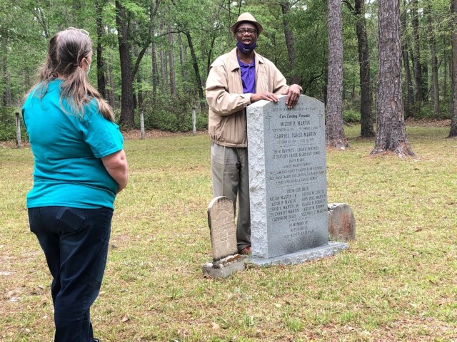 Chairman of the Liberty County Board of Commissioners and local historian, Donald Lovette shares a story with tour participants, April 15 at Cypress Creek Cemetery on Fort Stewart.