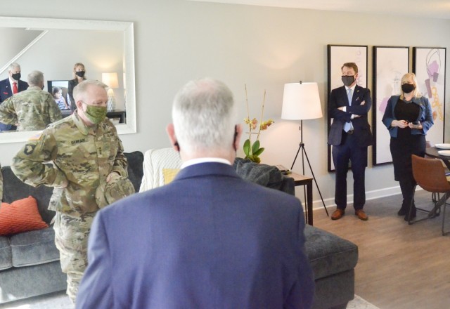 Lieutenant General Douglas Gabram, commanding general of U.S. Army Installation Command, tours the New Hammond Heights community for a look at its homes before and after scheduled renovations. Lendlease, in partnership with the United States Army,...