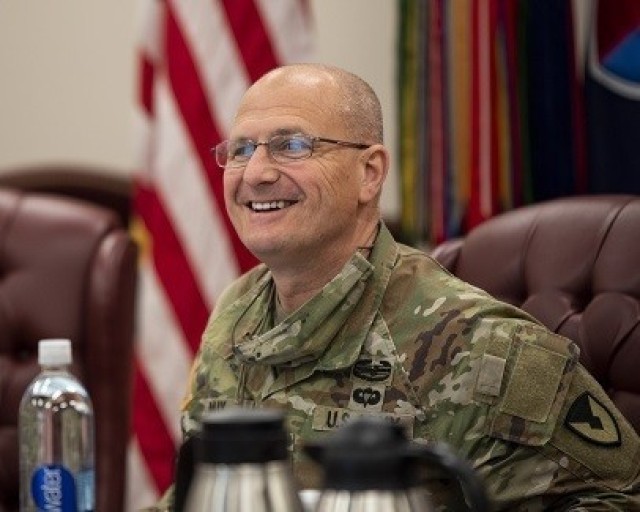 Gen. Ed Daly, commanding general of the U.S. Army Materiel Command, enjoys a lighter moment during an update briefing given April 22 at the U.S. Army Sustainment Command headquarters at Rock Island Arsenal, Illinois. (Photo by Linda Lambiotte, ASC...