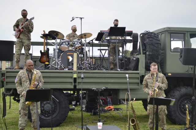 Members of the 101st Airborne Division (Air Assault) Band provide live music April 17 during Kidsfest: Magical Drive-thru, hosted by Morale, Welfare and Recreation at the division parade field.