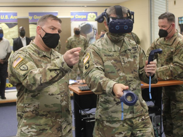 Gen. James McConville, the 40th Chief of Staff of the U.S. Army (right), tries out a virtual reality simulation during a tour of the Petroleum and Water Department Thursday, April 22, 2021 at Fort Lee, Va. McConville visited the Army post...