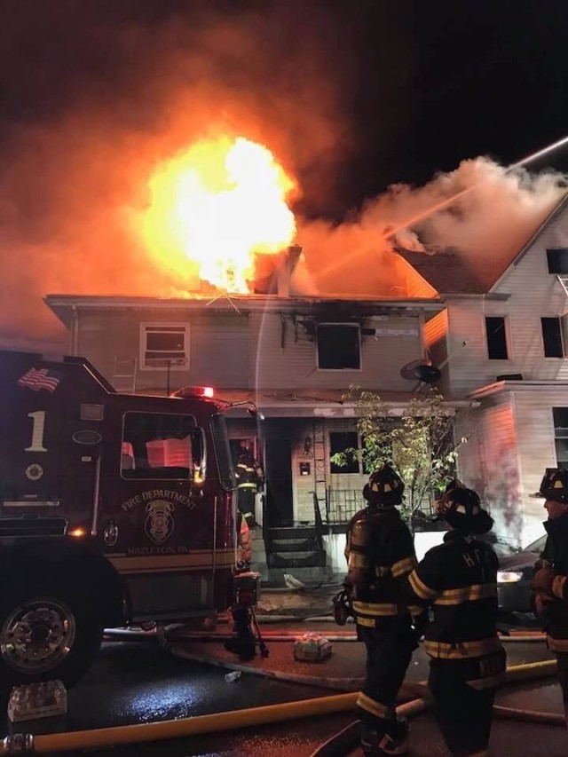 Warrant Officer Eric Martinez while on-call to a house fire with the Hazleton, PA fire department.