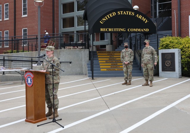 USAREC Headquarters Company Commander Capt. Jewel Burgherr addresses Soldiers and volunteers prior to the 2021 day of action cleanup.