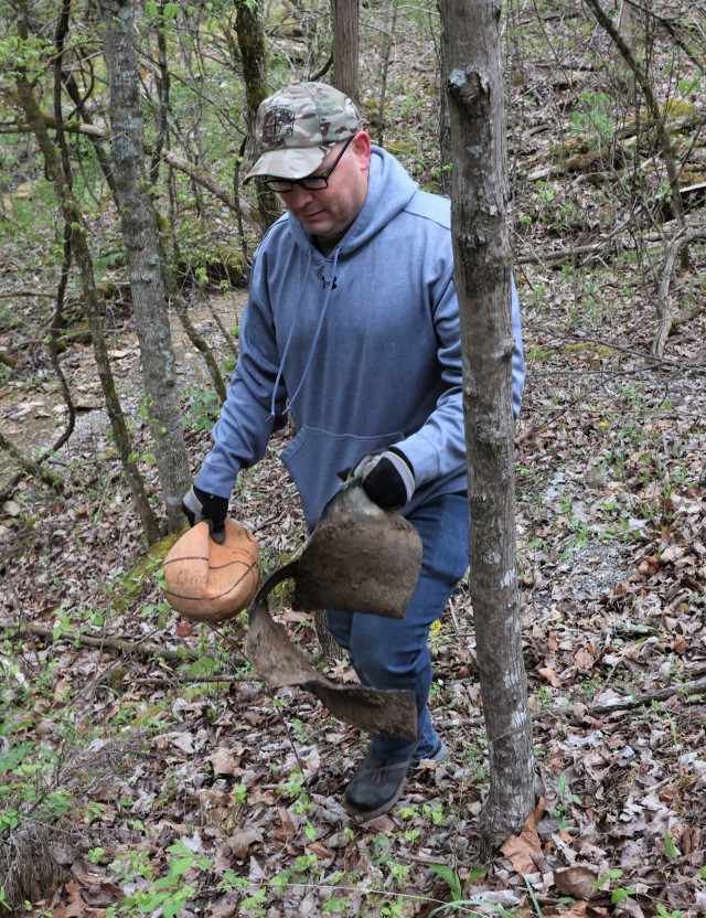 Members of the U.S. Army Recruiting Command, together with Family members and volunteers hiked through outdoor areas at and around Fort Knox April 23 to honor Earth Day and remove any trash.