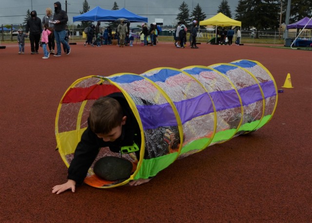 Community members and military children celebrated Joint Base Lewis-McChord&#39;s Kid Fest Apr. 24 at Cowan Stadium, the MWR Fest Tent, Child and Youth Services Field and Freedom Park on Lewis Main. 