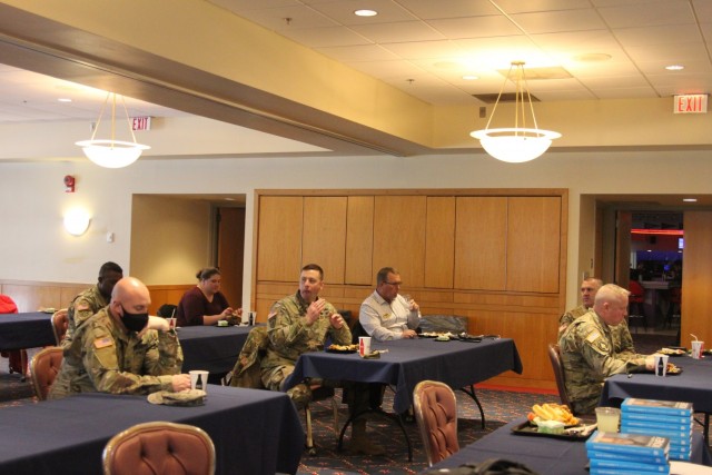 Fort McCoy, Wis., community members attend the celebration luncheon for and last class of Financial Peace University on March 16, 2021, at McCoy's Community Center. The class, which offers financial strategies and advice, was coordinated by the...