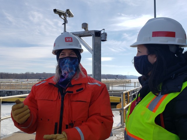 Judy Denzer, Lock and Dam 5 lockmaster, and Kim Warshaw, project manager, discuss the progress of the tow rail repair at Lock and Dam 5 near Minnesota City, Minnesota.