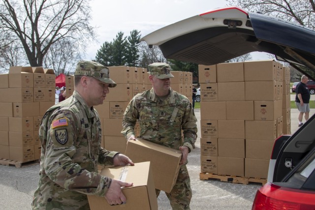 Staff Sgt. Jeffrey Miller, a unit supply specialist with 1st Battalion, 337th Brigade Support Battalion, 181st Multifunctional Training Brigade, left, and Sgt. 1st Class Sean Elwin, an infantryman with Headquarters and Headquarters Company, United...