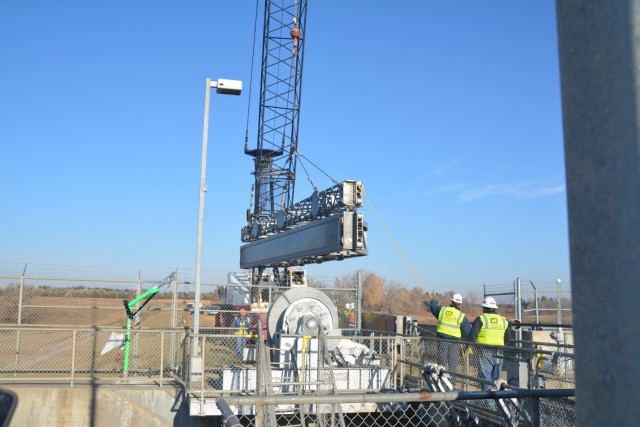 John Fromuth, U.S. Army Corps of Engineers, St. Paul District, Orwell Dam site maintenance lead, uses a specialized tool to open and close the dam’s lock chamber near Fergus Falls, Minnesota, Nov. 5.