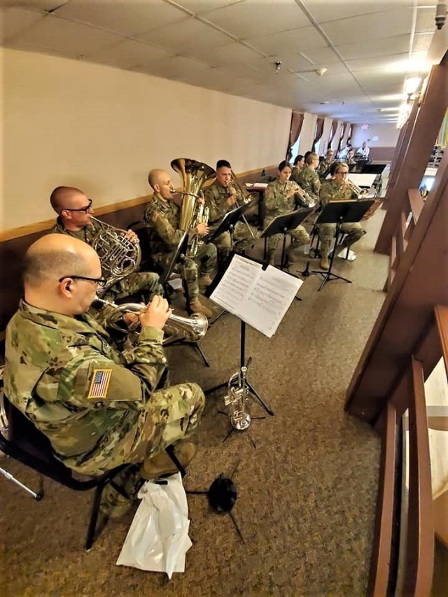 Members of the 204th Army Band of Fort Snelling, Minn., play a song in building 905 on May 18, 2019, during the 2019 Armed Forces Day Open House at Fort McCoy, Wis. Thousands of people attended the event that included bus tours of the installation, camouflage face painting, a display of native animals by the Fort McCoy Directorate of Public Works Environmental Division Natural Resources Branch, military vehicles and equipment, and unit and tenant organization displays. The post holds the open house every year on Armed Forces Day – the third Saturday of May. (U.S. Army Photo by Scott T. Sturkol, Public Affairs Office, Fort McCoy, Wis.)