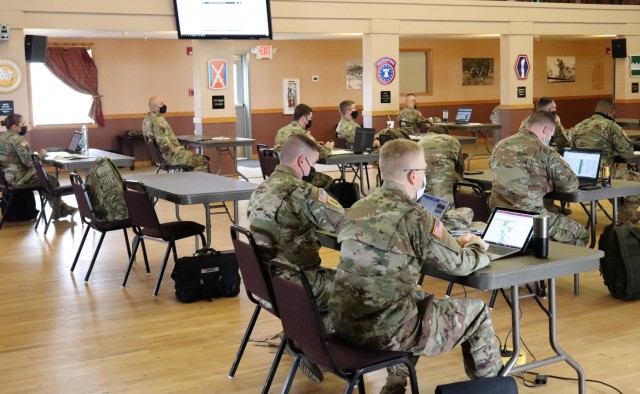 Twenty-three service members attend the Fort McCoy Directorate of Plans, Training, Mobilization and Security (DPTMS) Training Workshop on April 8, 2021, in building 905 at Fort McCoy, Wis. This was the first workshop held by DPTMS to assist unit representatives with the processes and requirements to schedule and hold training at Fort McCoy. The workshop took place April 7-8 and participants learned about range safety, range operations, range maps, and more. (U.S. Army Photo by Scott T. Sturkol, Public Affairs Office, Fort McCoy, Wis.)