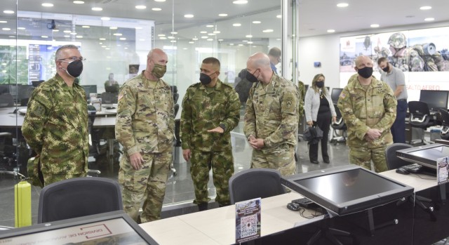 Staff officers for the Colombian Army brief Brig. Gen. Douglas Lowrey, commander of U.S. Army Security Assistance Command, during a visit to a flight tracking center at a Colombian Army base in Bogota, Colombia, 6 April 2021. Brig. Gen. Lowrey, and members of his staff, visited several sites to see the impact of U.S. security assistance and foreign military sales, in support of the Colombian military in defending their country from counter-narcotic and terrorist threats. (U.S. Army photo by Richard Bumgardner)