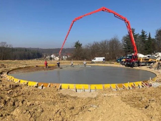 Crews pour concrete at the site for a new helicopter landing zone at the primary hospital in Karlovac, Croatia in March 2021 as part of a project being managed by the U.S. Army Corps of Engineers, Europe District in support of the U.S. European...