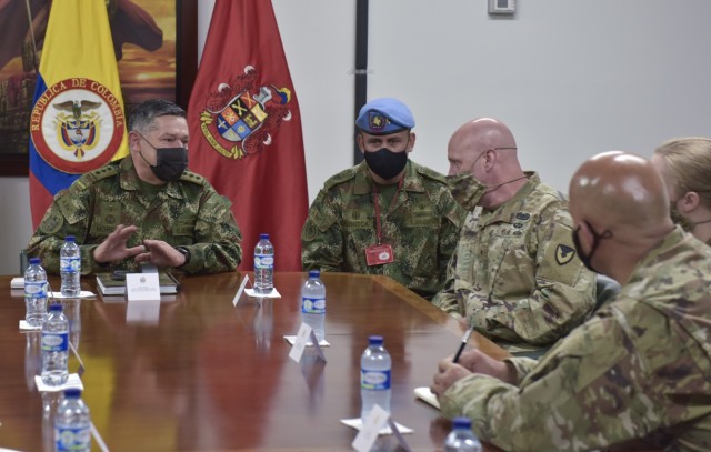 Maj. Gen. Carlos Moreno, left, the 2nd in command for the Colombian Army, briefs Brig. Gen. Douglas Lowrey, commander of U.S. Army Security Assistance Command, during a key leader engagement at a Colombian Army base in Bogota, Colombia, 5 April 2021. Brig. Gen. Lowrey, and members of his staff, visited several sites to see the impact of U.S. security assistance and foreign military sales, in support of the Colombian military in defending their country from counter-narcotic and internal threats. (U.S. Army photo by Richard Bumgardner)