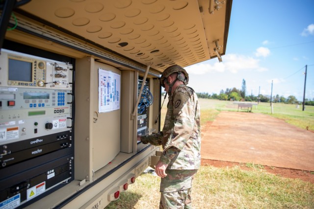 Spc. Ryan Gillard, a Satellite Communications Operator Maintainer with the 73rd Signal Company, Division Sustainment Troops Battalion, 25th Infantry Division Sustainment Brigade, 25th Infantry Division, ensures that his equipment is online during...