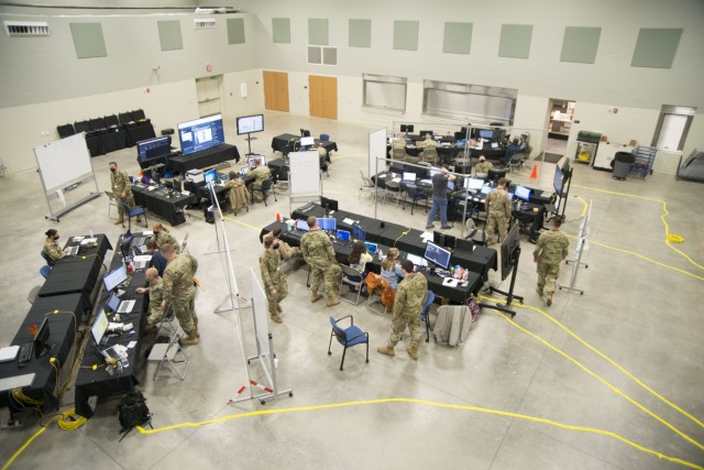 An overview photo of the Exercise Locked Shields 21 operations center in Morgantown, W. Va., is captured as exercise participants work to secure networks and compete against 21 other Blue Teams across the globe. Locked Shields 21 is the world's...