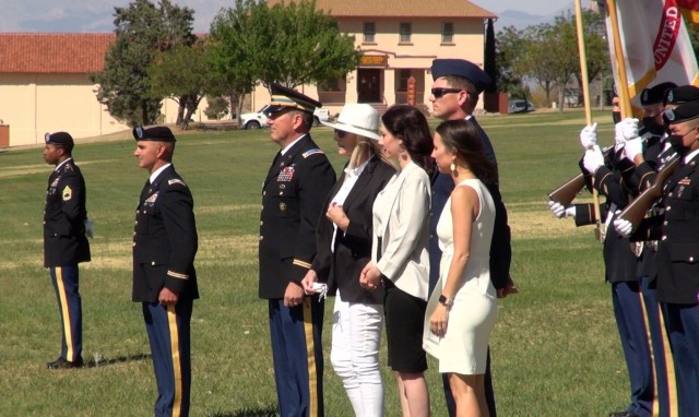 Chief Warrant Officer Five John Segerlund and family stand on  Brown Parade Field  as the Soldier retires after 35 years of military service at a ceremony on Fort Huachuca, Ariz.