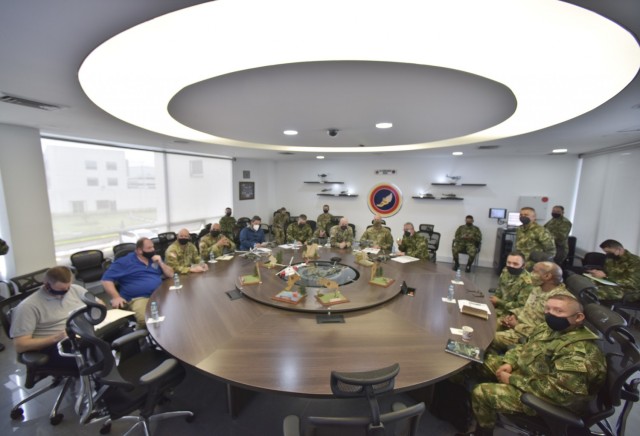 Maj. Gen.Elder Giraldo, chief of operations for the Columbian Army, center, briefs Brig. Gen. Douglas Lowrey, commander of U.S. Army Security Assistance Command, during a key leader engagement at the División de Aviación Asalto Aéreo...