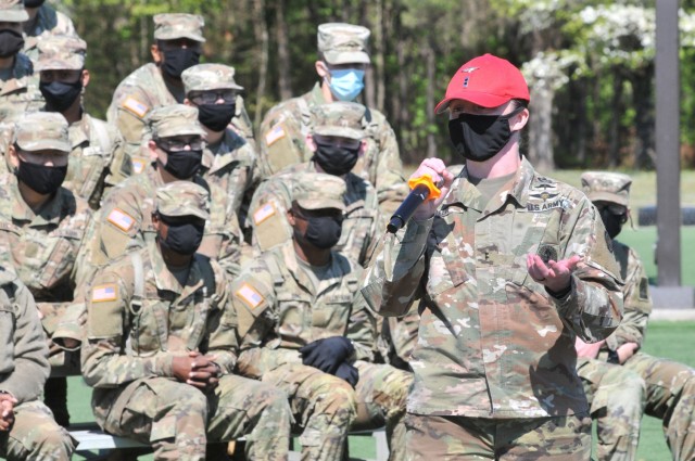 Chief Warrant Officer 2 Virginia Greer speaks before students at the annual Jumping for SHARP event April 22 at Stillions Field.  She was one of three guest speakers who shared experiences with involving sexual assault with advanced individual...