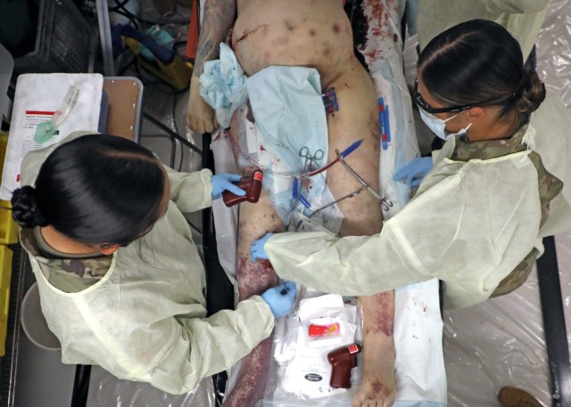 Soldiers assigned to Charlie Company, 2nd Battalion, 25th Brigade Support Battalion, 2nd Brigade Combat Team, 25th Infantry Division conduct Perfused Cadaver Training at the Medical Simulation Training Center on Schofield Barracks, Hawaii, April 14, 2021. The training allowed Soldiers to train on human tissue to better equip them for the battlefield.
(U.S. Army Photo by Master Sgt. Andrew Porch)