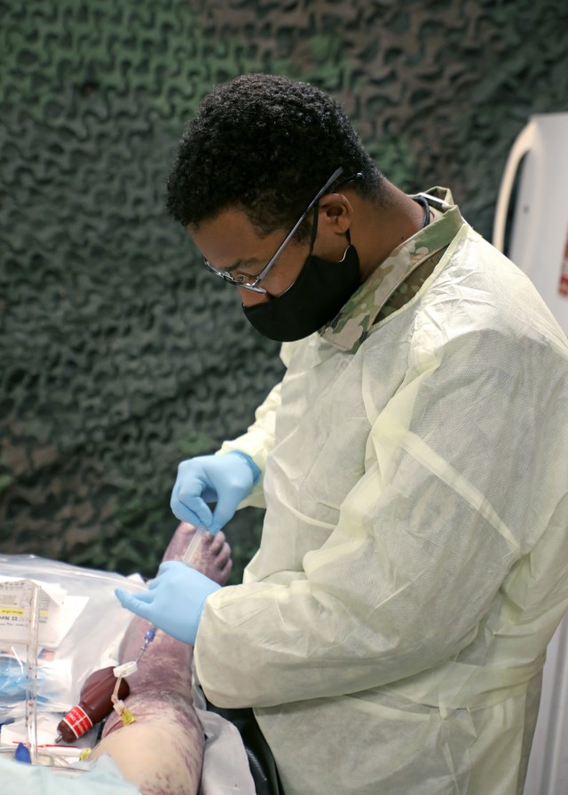 Spc. Dameon Frovarp, healthcare specialist assigned to Charlie Company, 2nd Battalion, 25th Brigade Support Battalion, 2nd Brigade Combat Team, 25th Infantry Division Perfused Cadaver Training at the Medical Simulation Training Center on Schofield Barracks, Hawaii, April 14, 2021. “Making sure we are able to do our jobs, isn’t just benefiting to us, but to the Army as a whole,” said Frovarp. “As medics, we are out there trying to save people, so making sure we are able to do our jobs correctly just helps everyone out. I just believe it will give me the knowledge and the confidence to go out there and do what has to be done. If I’m ever out in the field and need to save a life; I’ll know what’s coming and what to expect.
(U.S. Army Photo by Master Sgt. Andrew Porch)