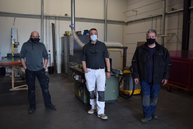 BRUNSSUM, Netherlands -- From left, Jeroen Smeets, carpenter; Hilmo Korac, painter; and Math Kubben, ground maintenance worke, at U.S. Army Garrison Benelux - Brunssum collectively share 72 years of experience working for the U.S. Army in the Netherlands and the tri-border area. (U.S. Army photo by Naomi van Loon, USAG Benelux Public Affairs)