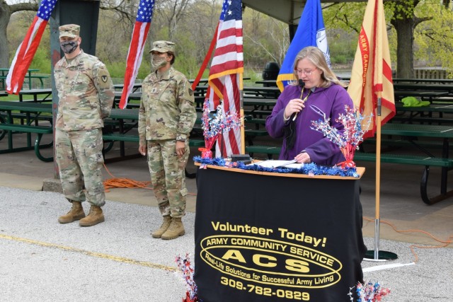 Chassity Morse, Army volunteer corps coordinator, U.S. Army Garrison Rock Island Arsenal, gives opening remarks during the Volunteer Recognition Ceremony held April 20 at Memorial Park on Rock Island Arsenal.